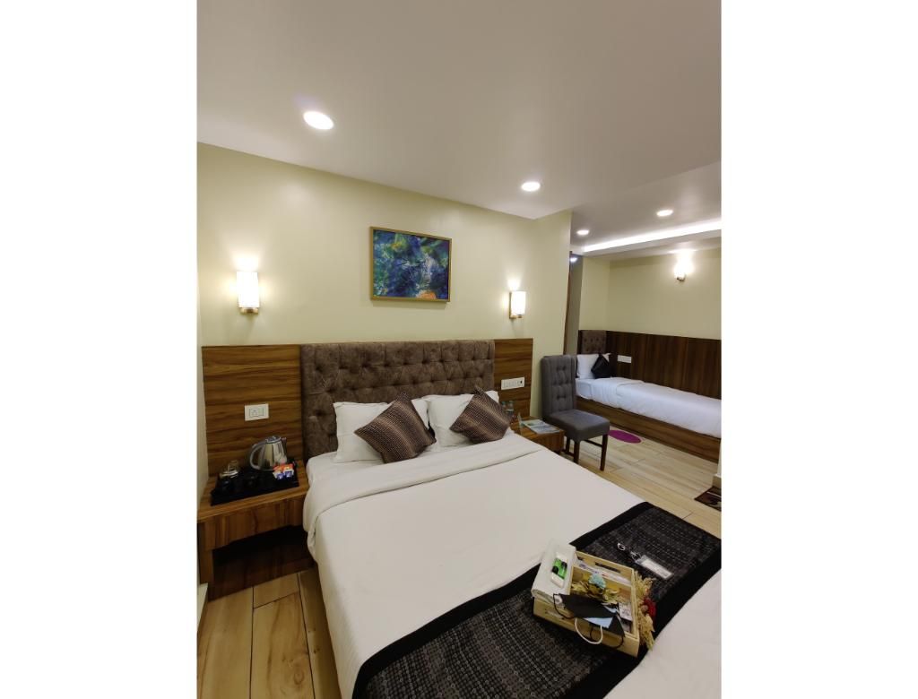 Queen Triple Bed Suite Room