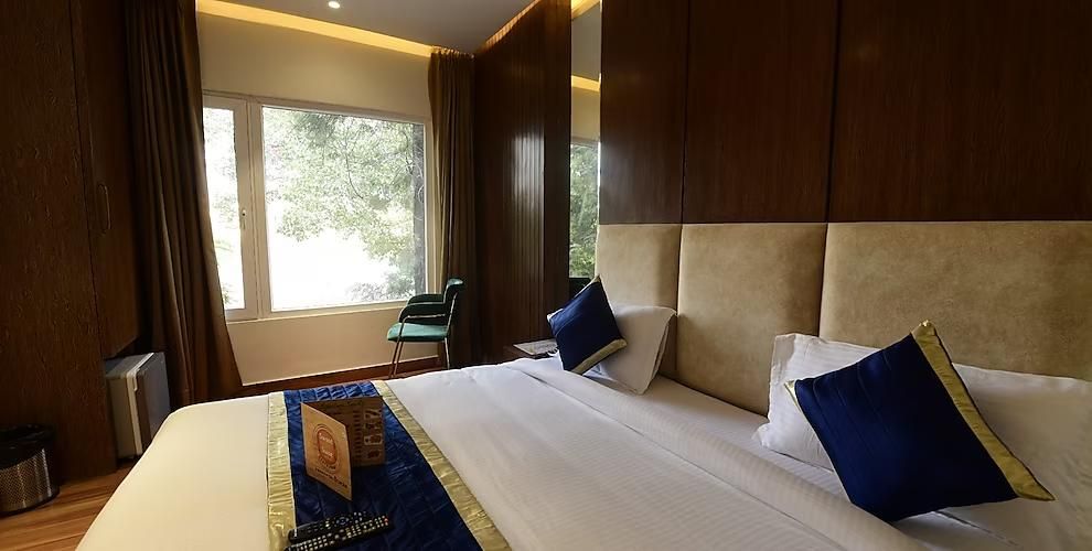 Stamps Golden Lagoon by Eight Continents Jallianwala Bagh Luxury Room 