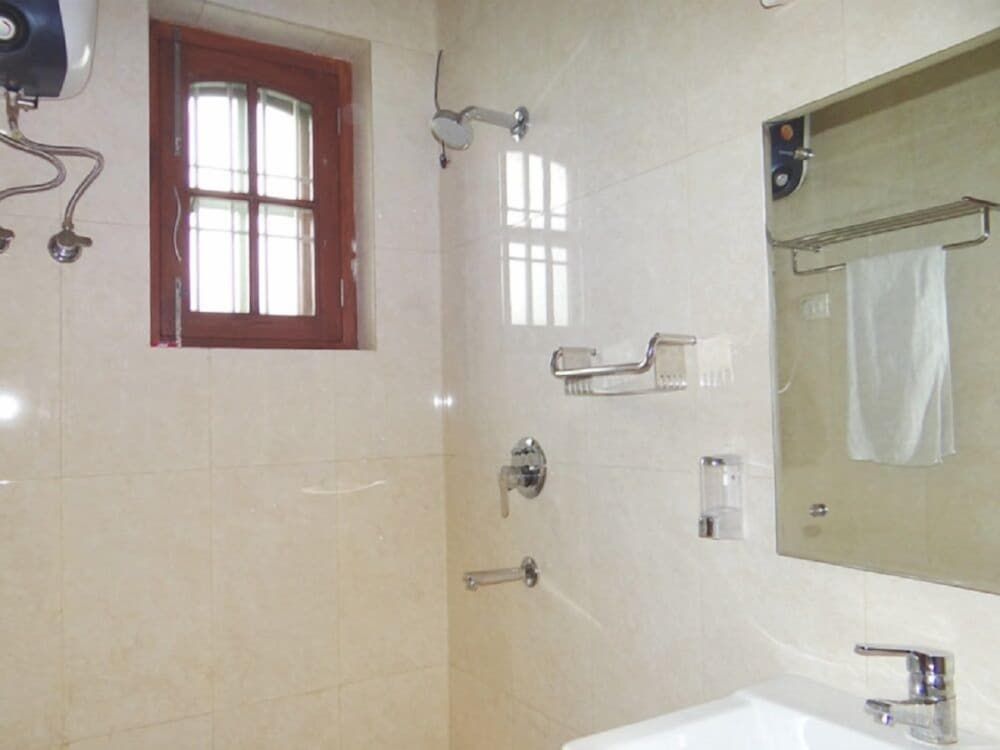 Angel NRI Hotel Deluxe Room 3