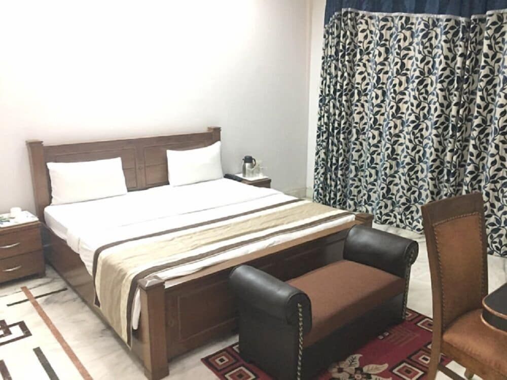 Angel NRI Hotel Deluxe Room