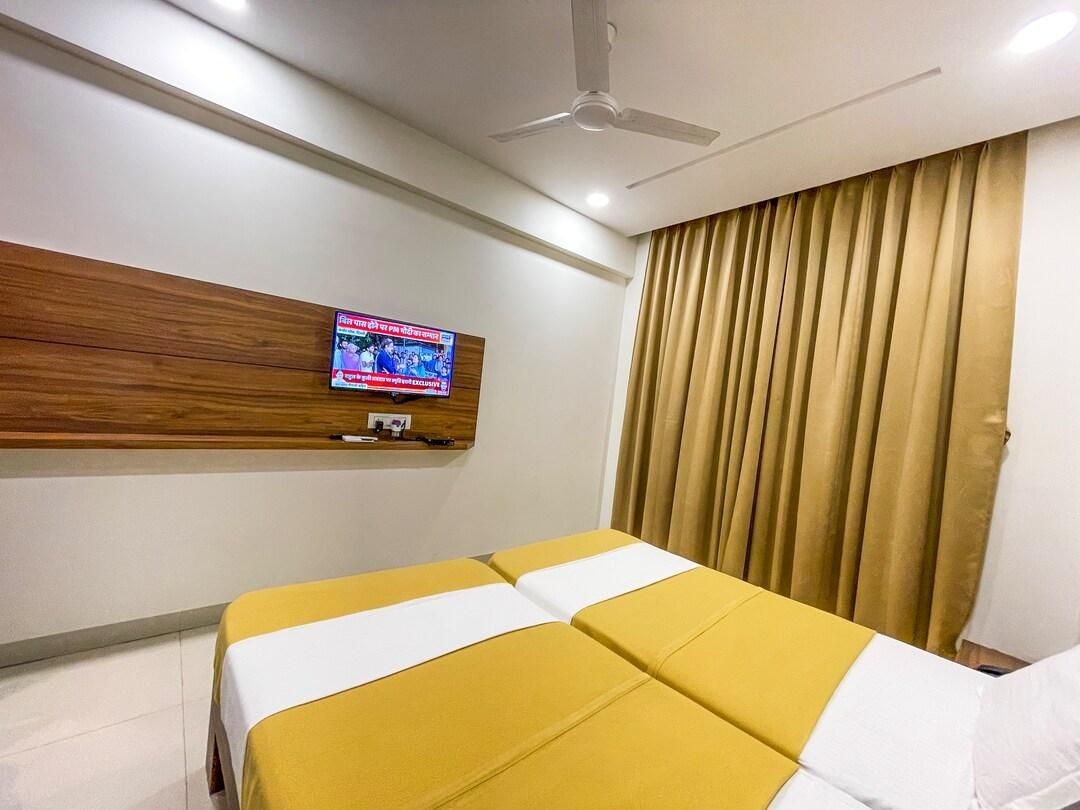 StayGuru Hari Om Residency Superior Deluxe Room 2