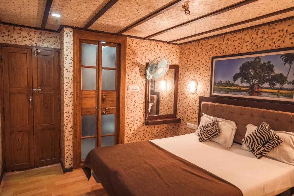 Venice Houseboats Alleppey Deluxe room on sharing Houseboats AC timings 8pm to 6 am 8