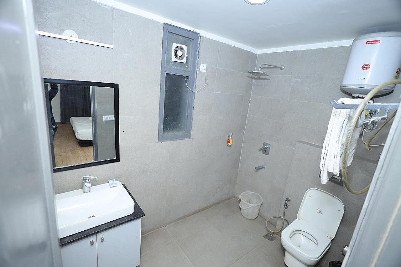 Hotel Wedlocks Premium Sohna Road Standard Room with Balcony 5