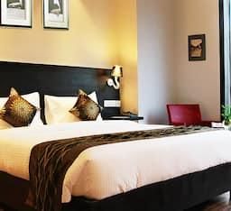 Joy Inn & Suites Deluxe Room 