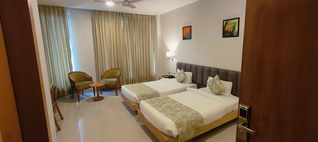 Monday Hotels Mahape Deluxe Room