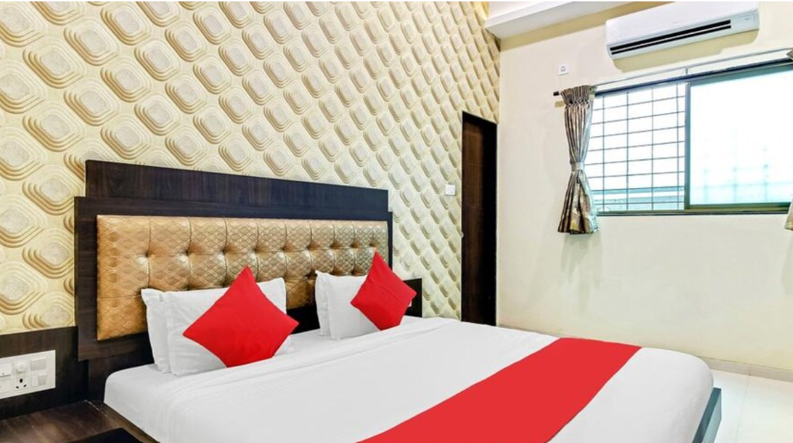  Omkar Hotels & Lawn  Deluxe Room 2