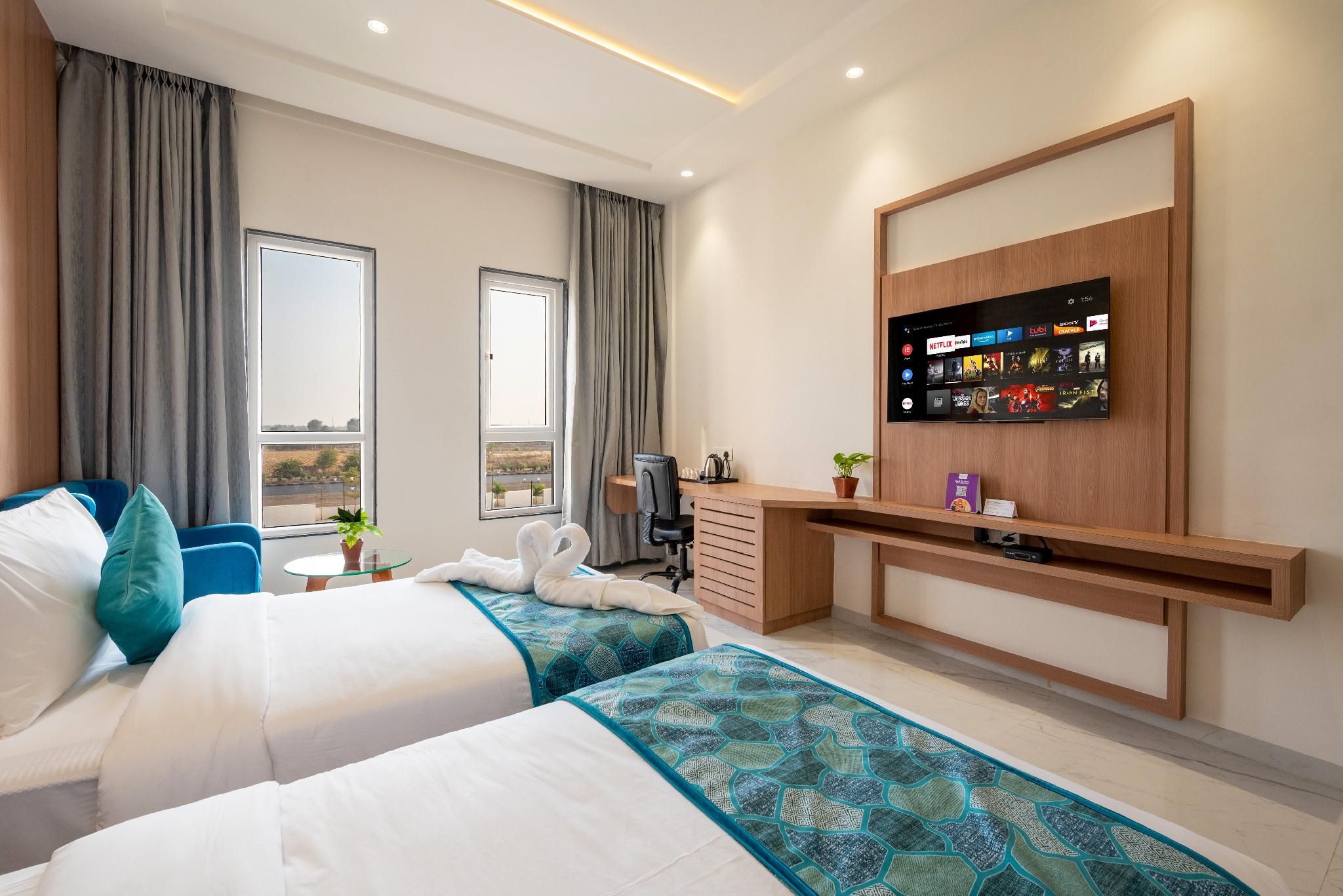 The Orchid Jamnagar Deluxe Room Twin Bed 2