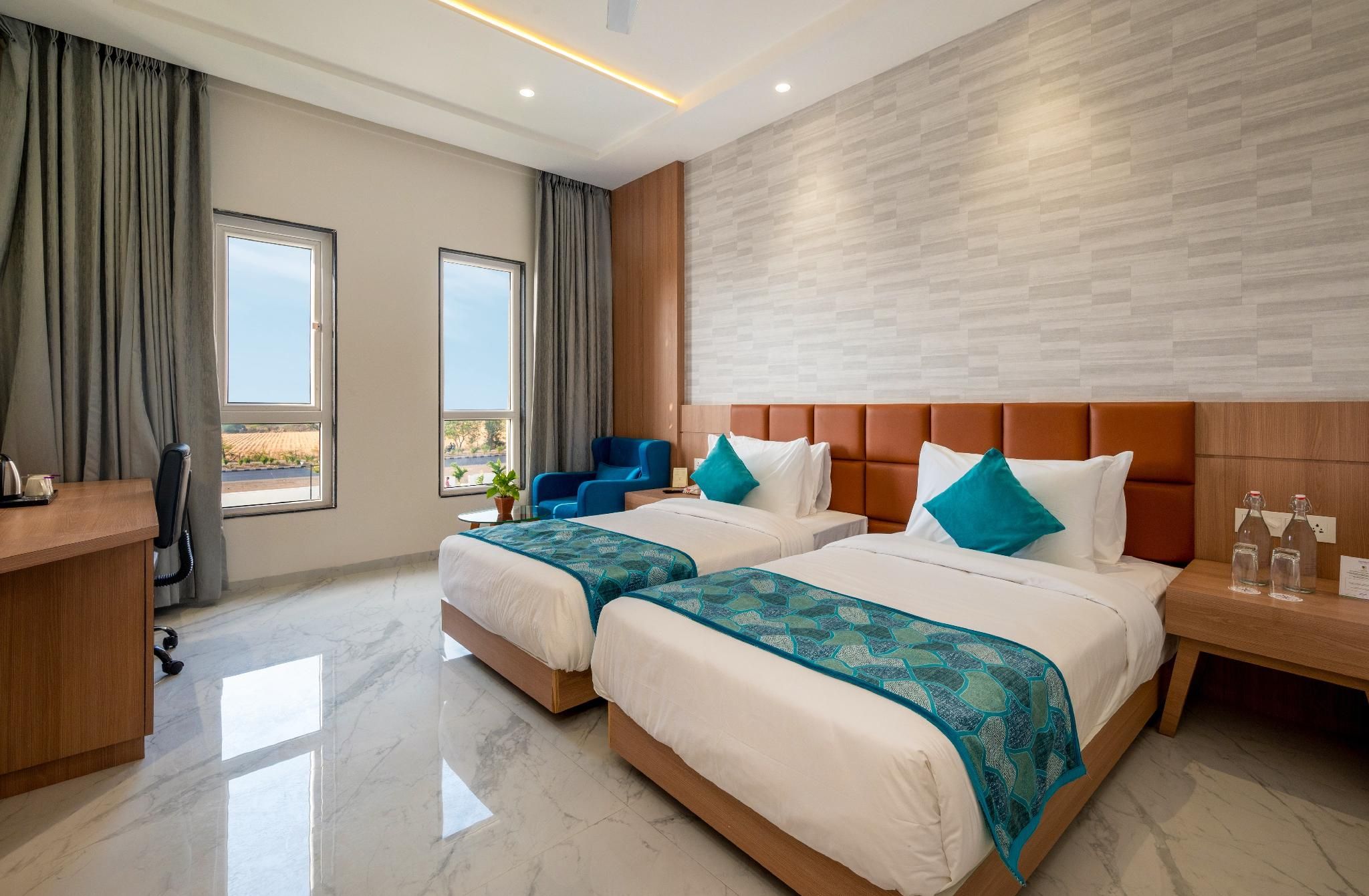 The Orchid Jamnagar Deluxe Room Twin Bed 3