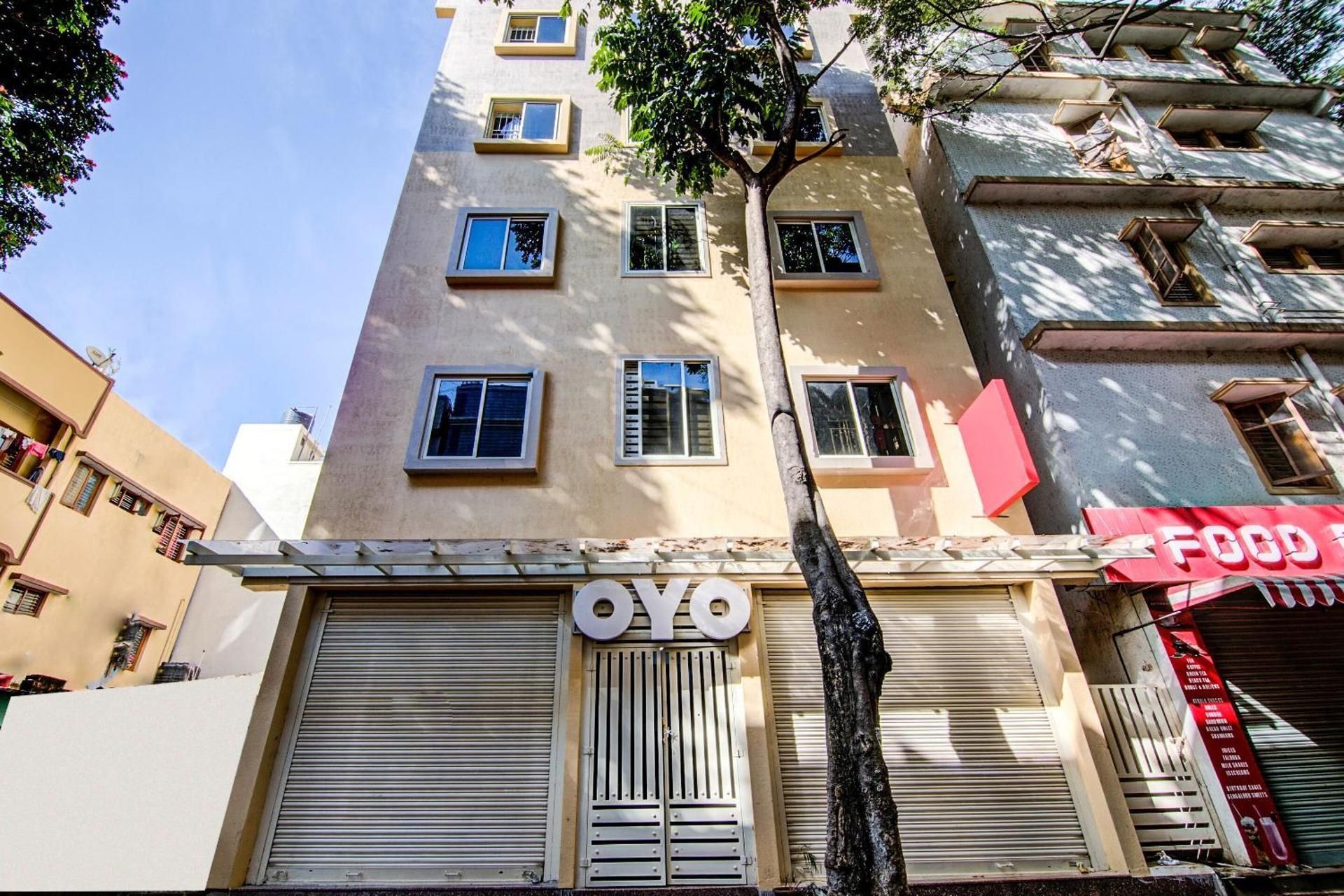 Super OYO Varcity Comforts Near Ragigudda Sri Prasanna Anjaneyaswamy Temple