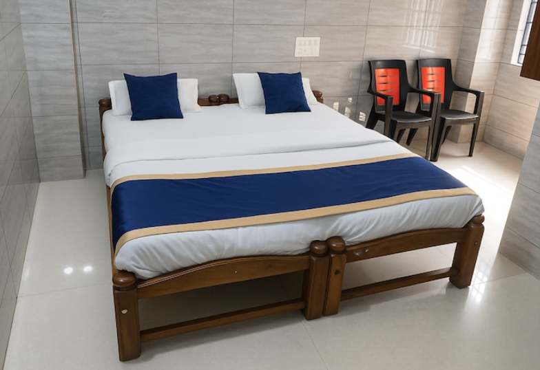 Aryan Residency Balcony Deluxe Double Bed