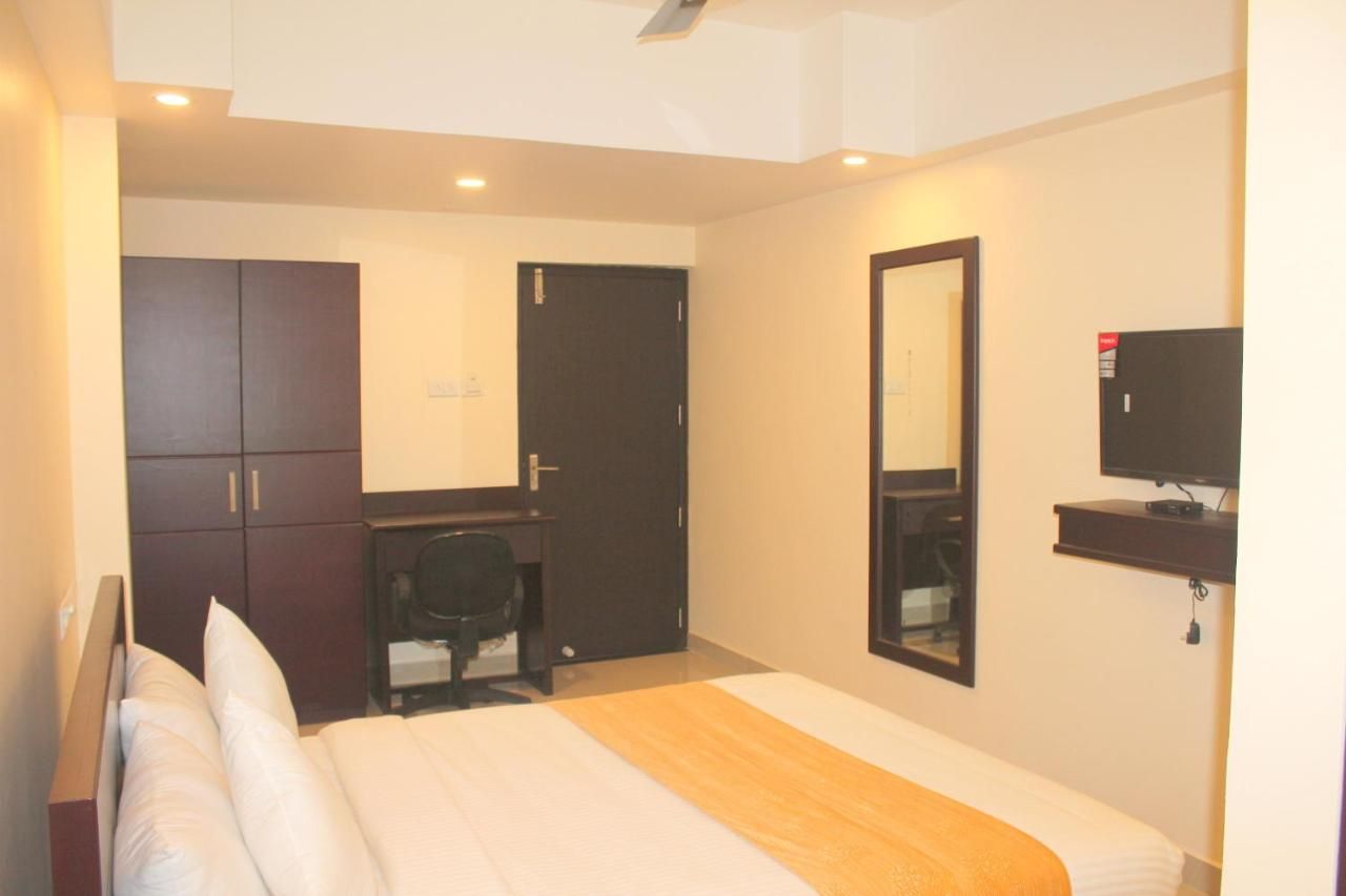Aura Residency Deluxe Double Room 9