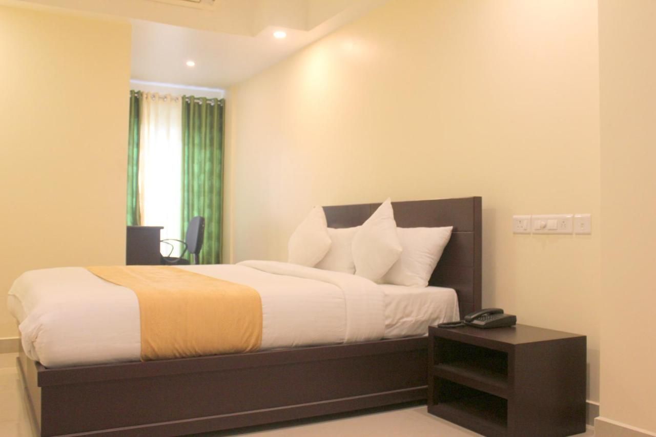 Aura Residency Deluxe Double Room 6