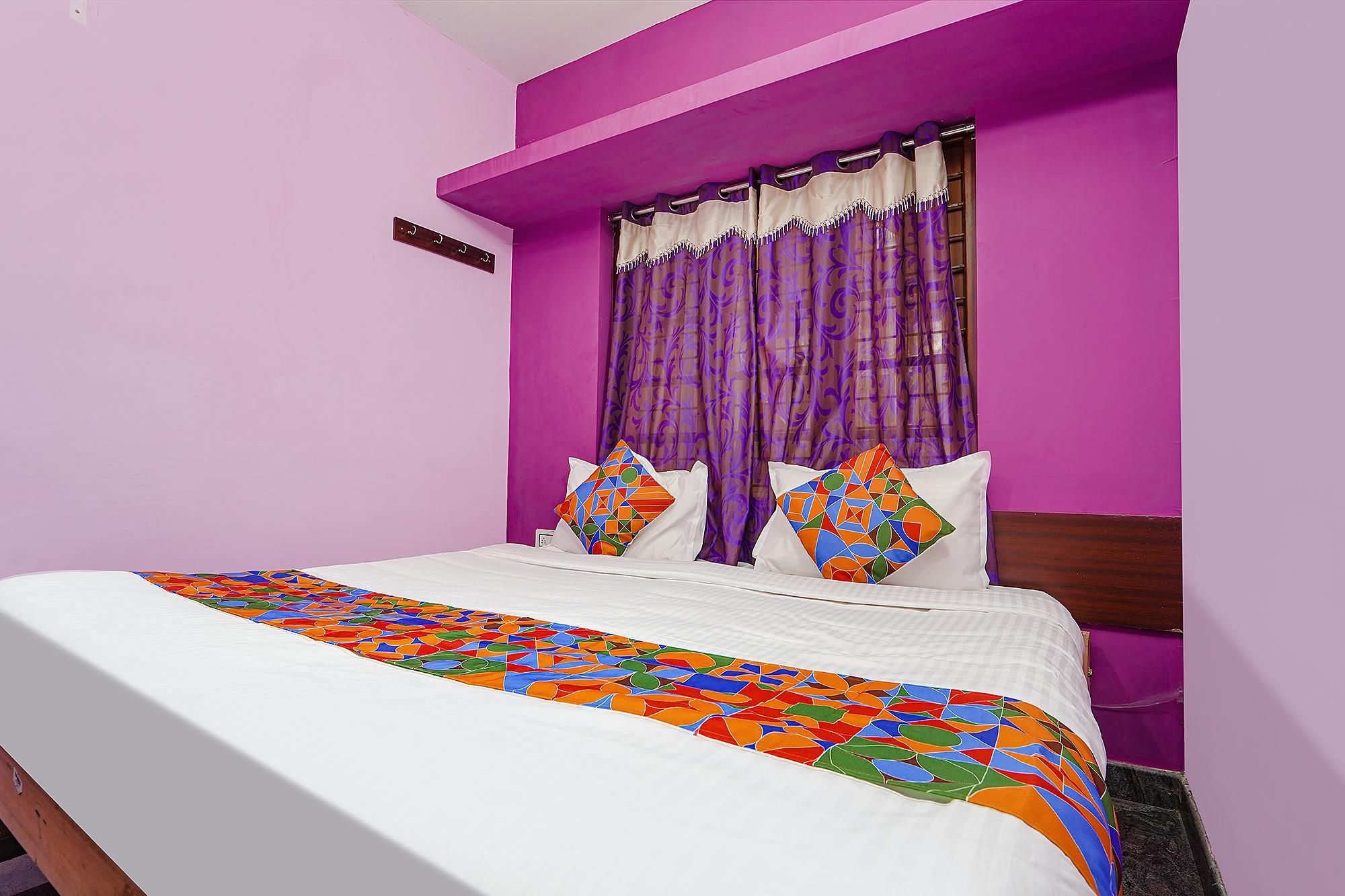FabExpress Annai Illam Deluxe Room 4