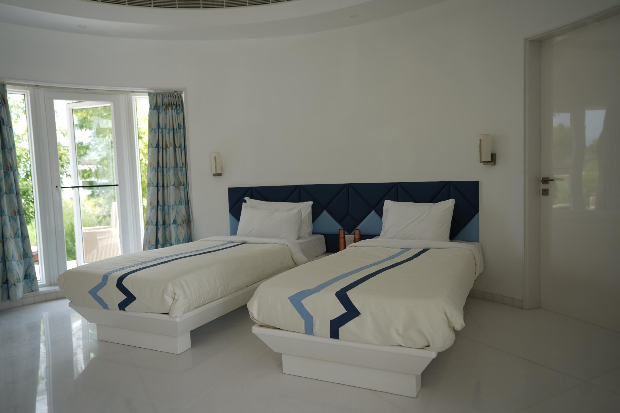 Ashok Vatika Ananta Elite Ranakpur Cottage Room with 2 Single Beds 2