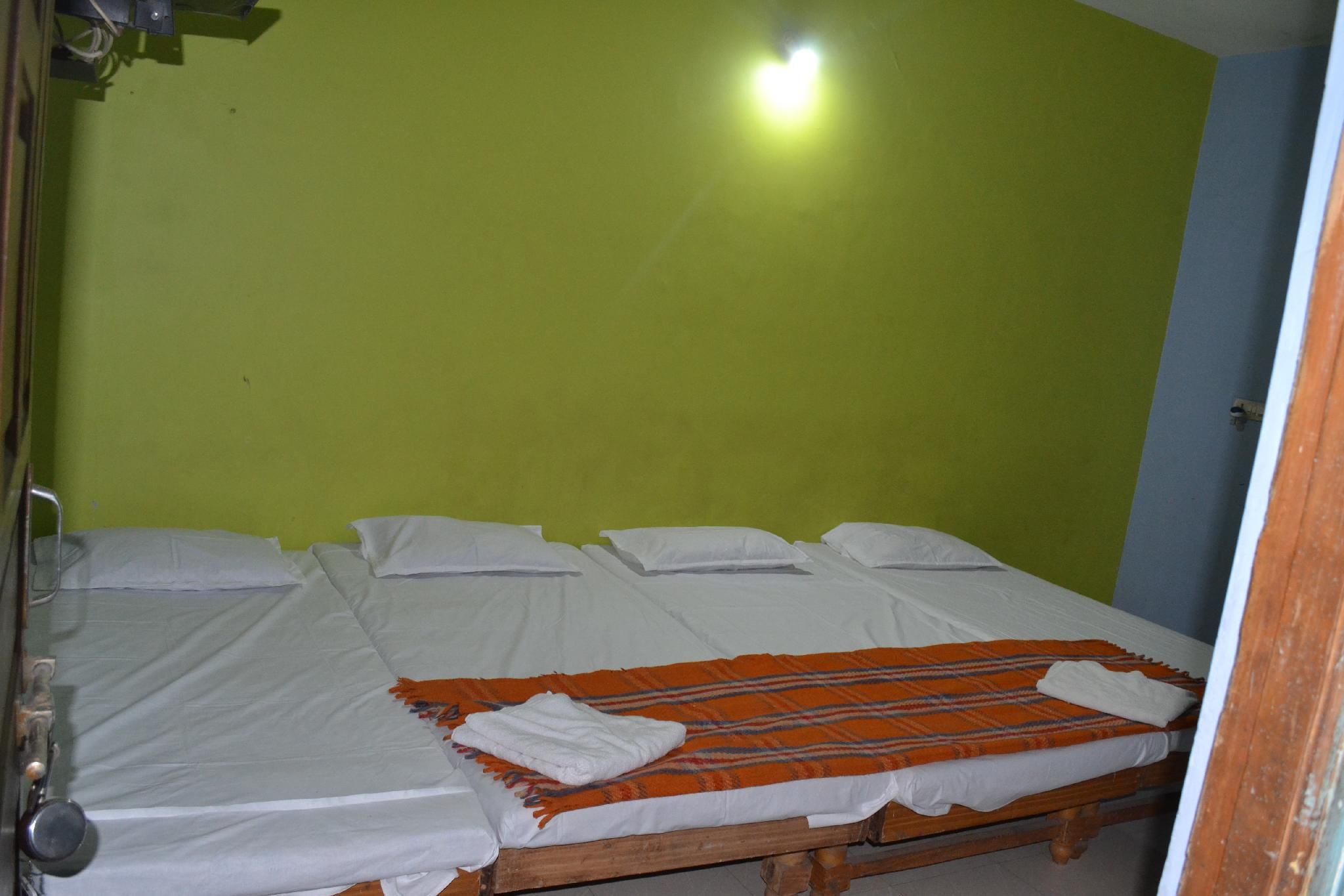 Room with 4 Beds and Shared Bathroom