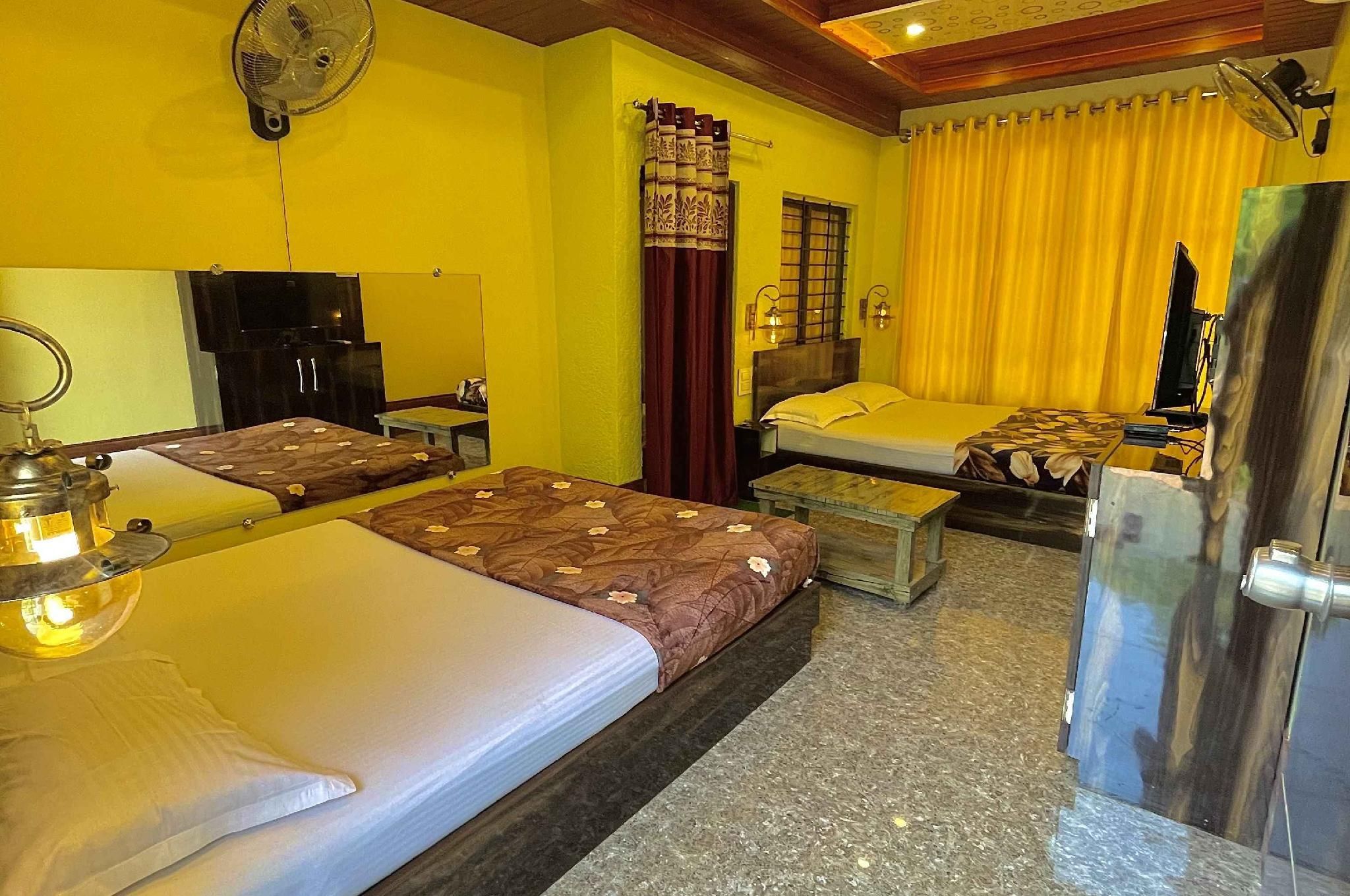 Natural resort panhala Deluxe Family Twin Room 3