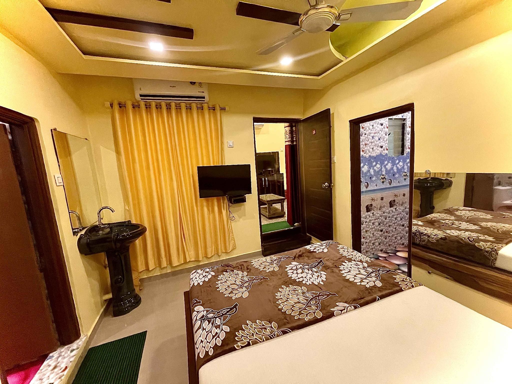 Natural resort panhala Deluxe Family Twin Room 2