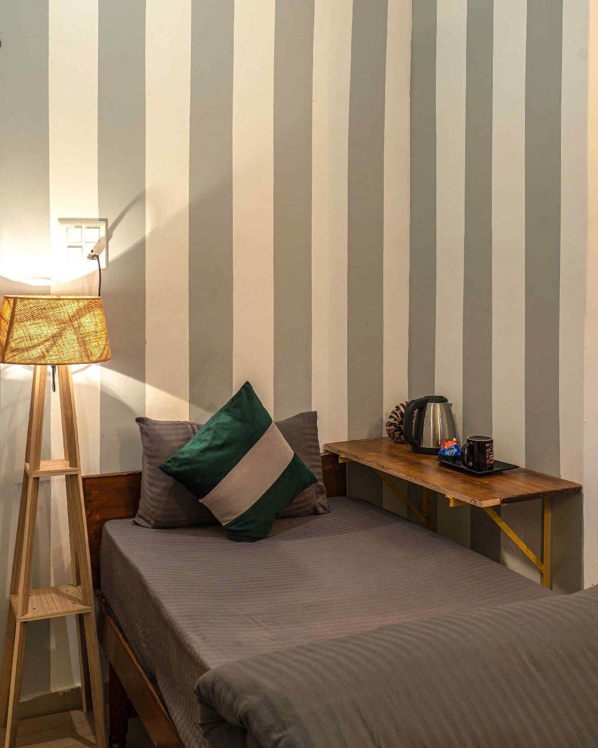 Single Bed Non-AC Room with Shared Bathroom