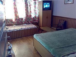 Luxury Three Bedded Room