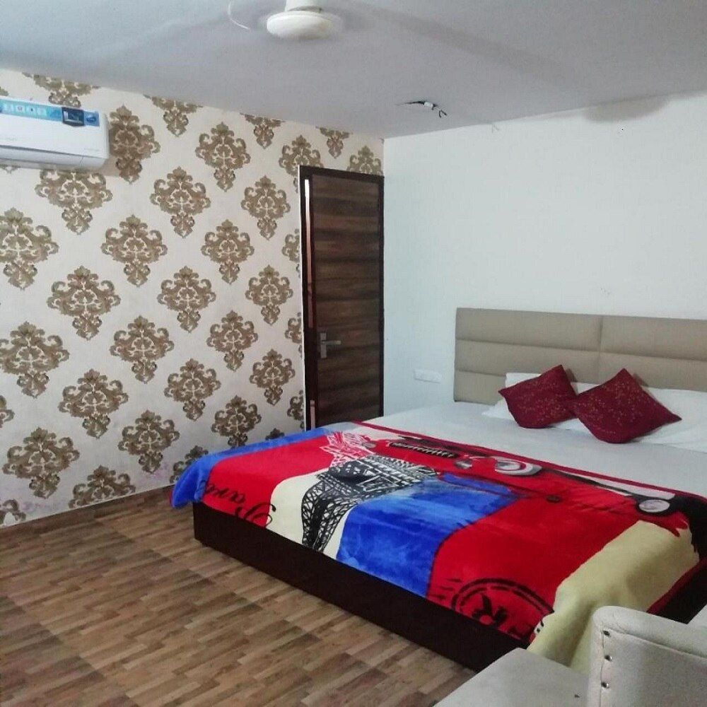 Deluxe Room with Air Conditioning