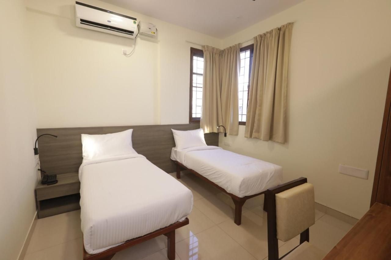 Connecting Family Rooms with Queen Bed and 2 Single Beds