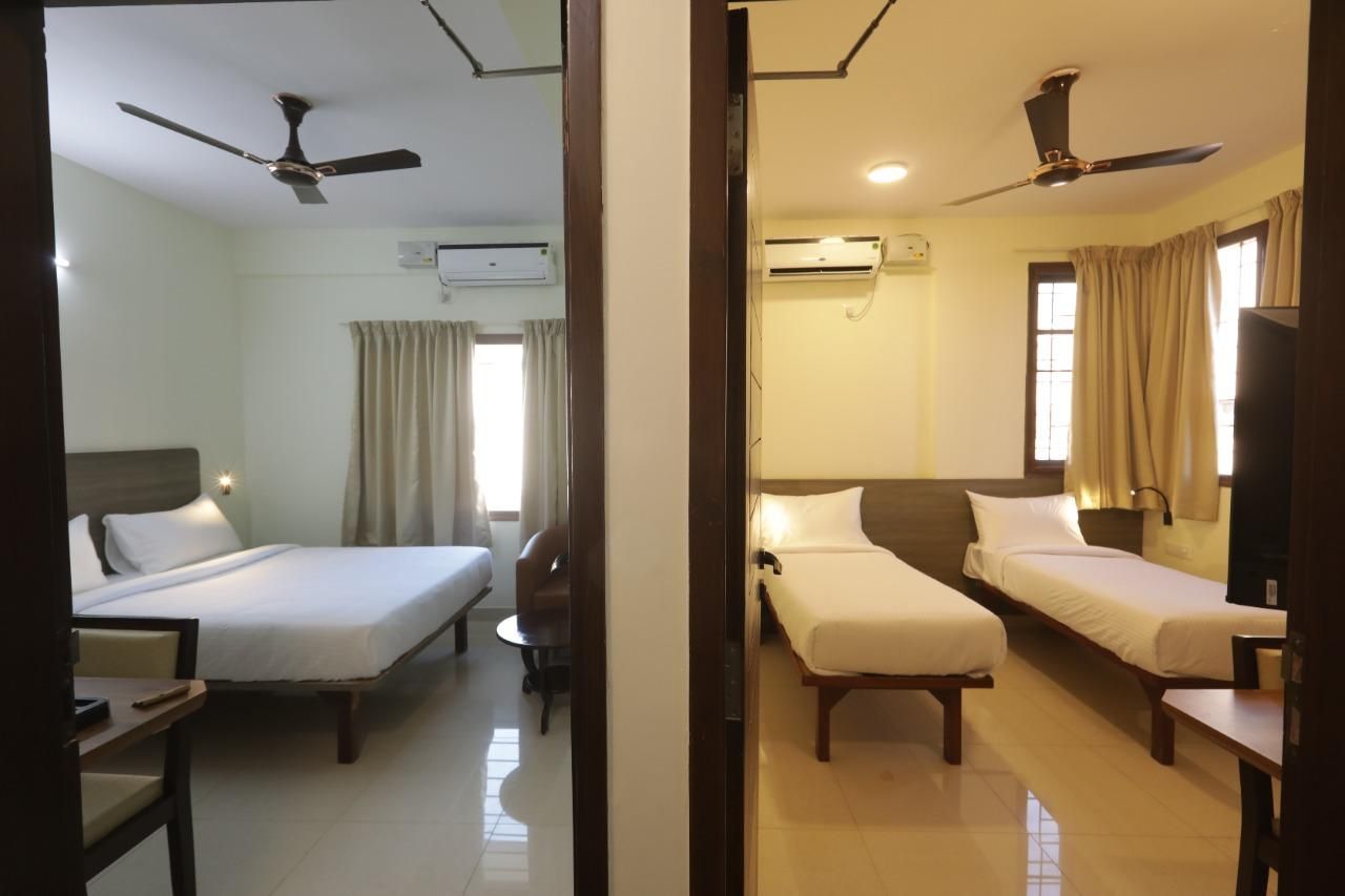 Connecting Family Rooms with Queen Bed and 2 Single Beds