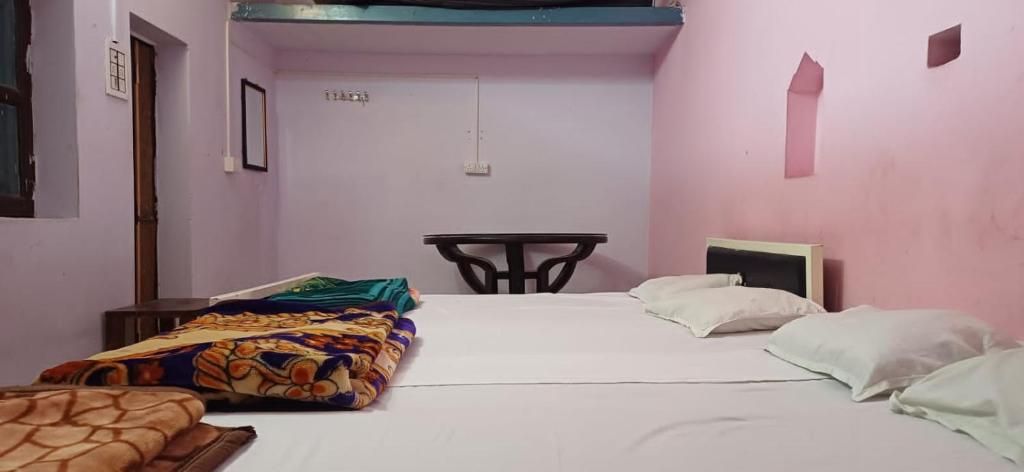 Quadruple Room-4 Double Beds(Non AC)