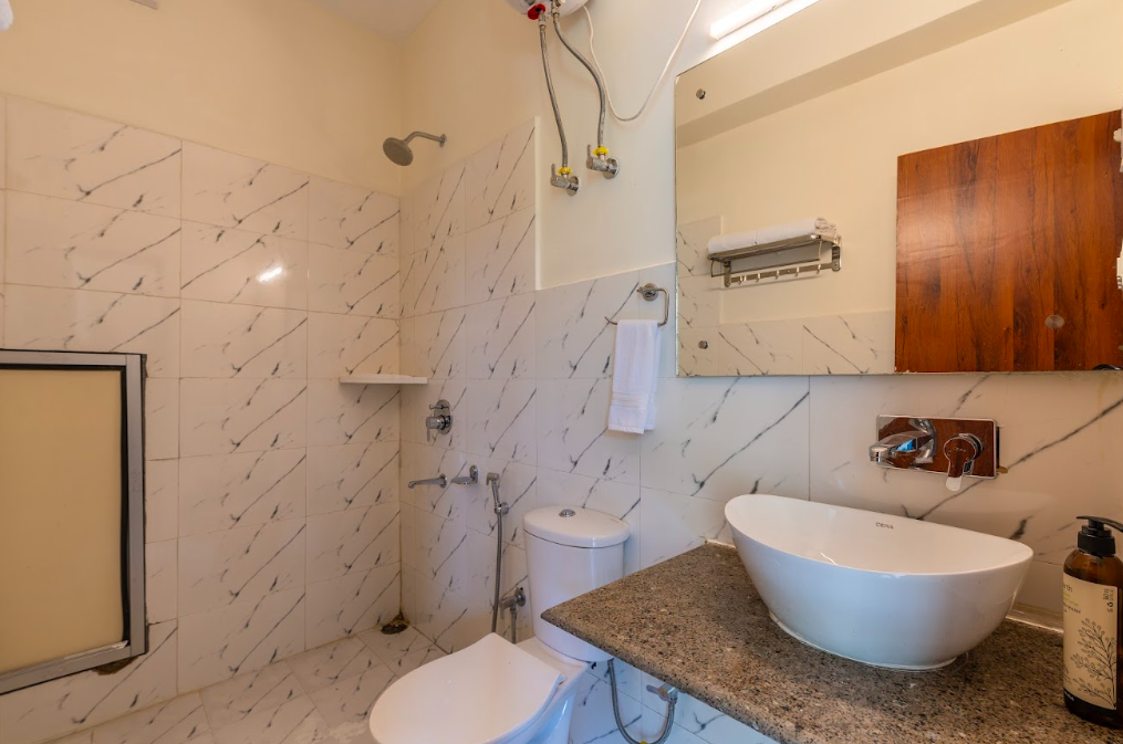 Deluxe Private AC Room with Balcony & Road View and Ensuite Bathroom