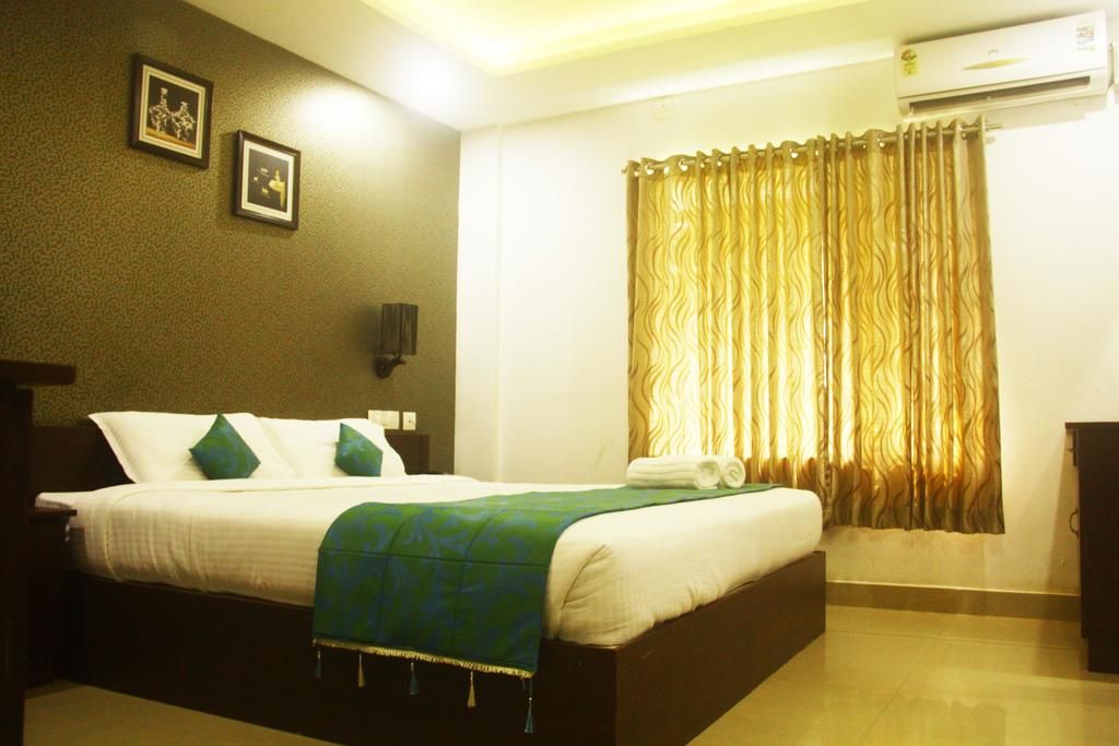DELUXE AC DOUBLE ROOM WITH SMALL BALCONY