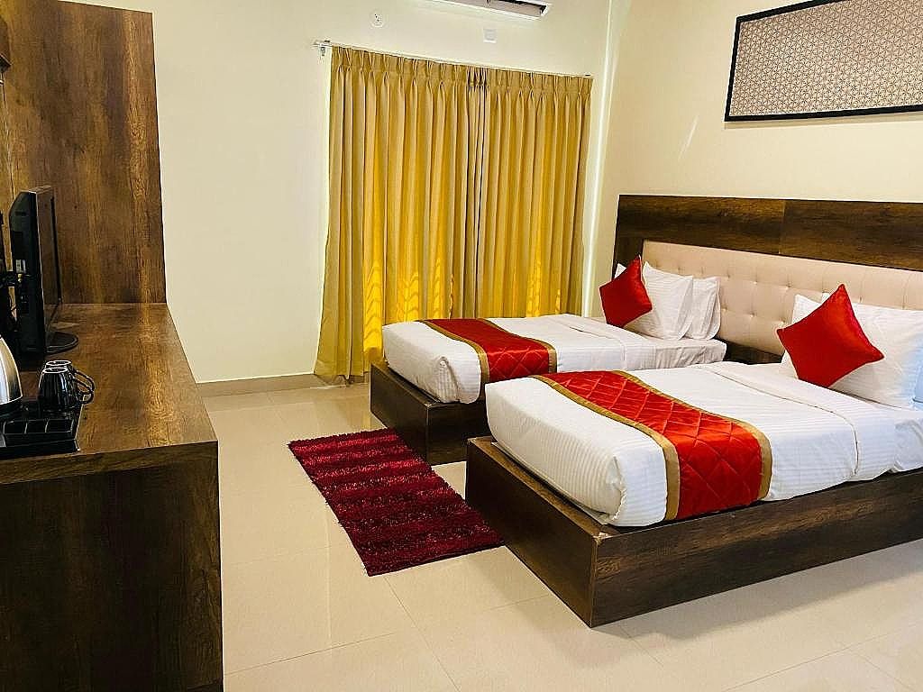Treebo Cranberry Delight Executive Room 4