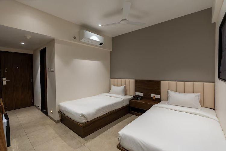 Living Hub Business Hotel, Kolhapur Twin AC Bedroom  2