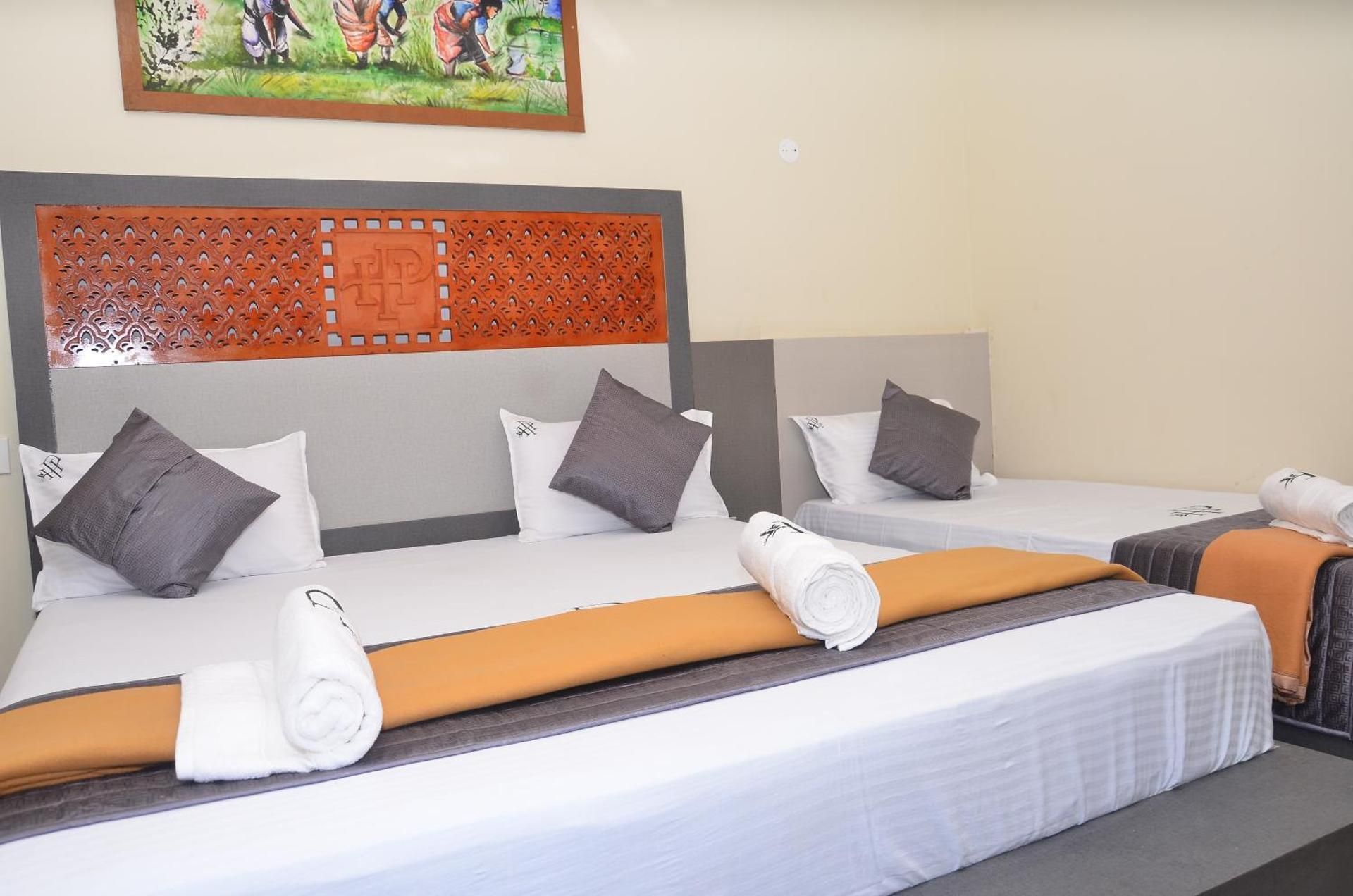 Hotel Panchavarnaa Triple Deluxe Room 3