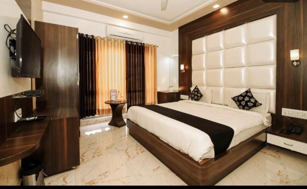 Mangal Residency and Rooftop Pool Premium Room  4