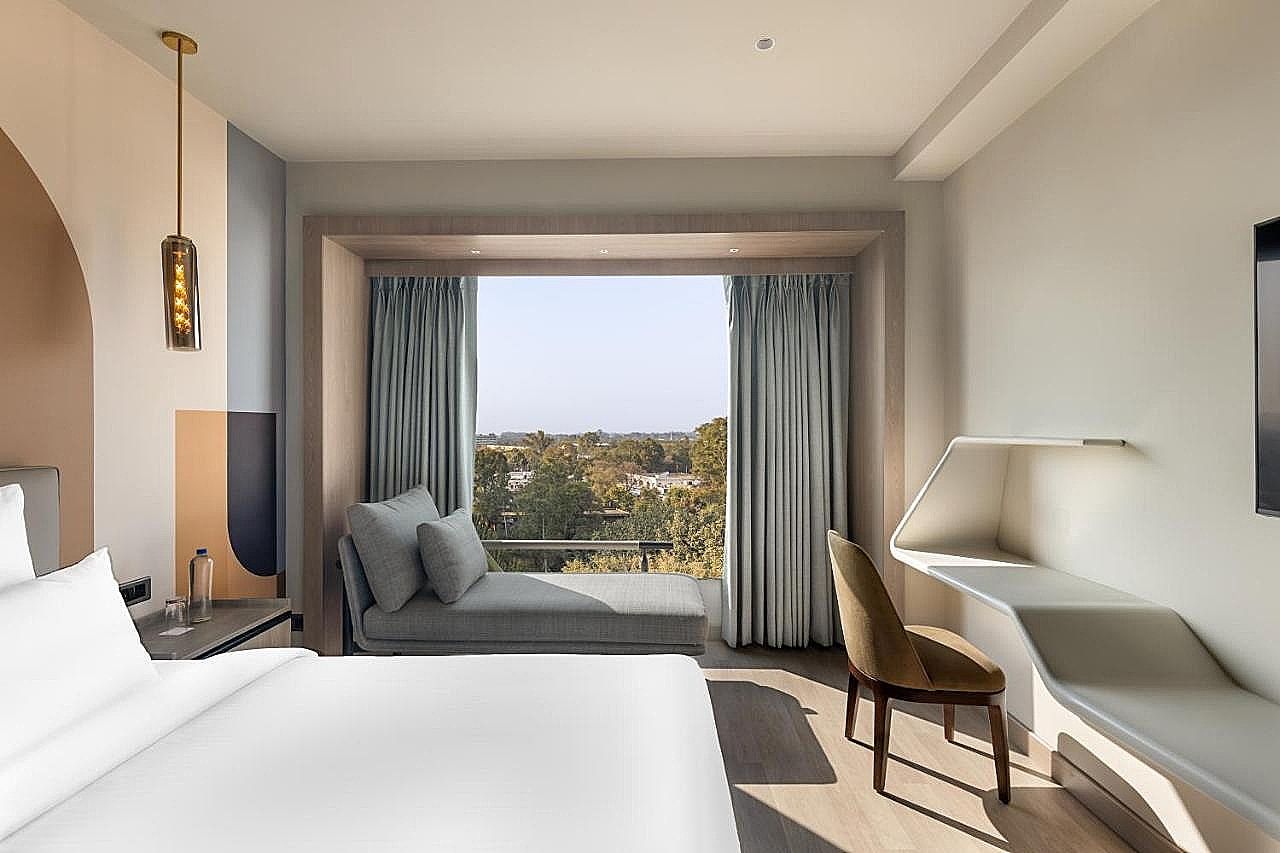 Mercure Chandigarh Tribune Chowk Classic Room with 1 double bed and sofa 3