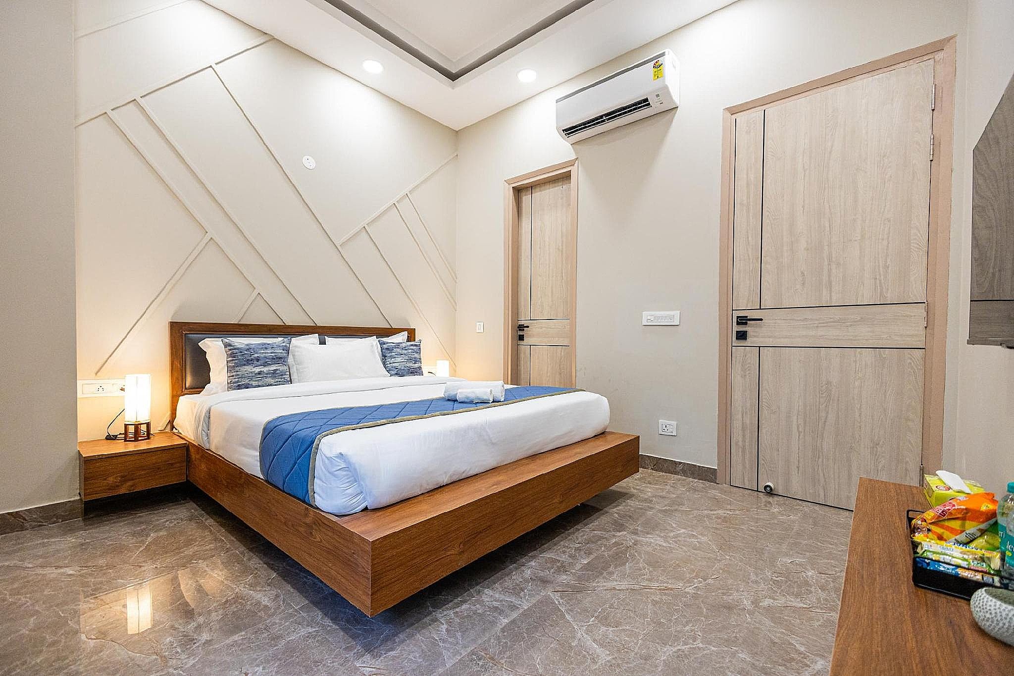 Axon Mayfield Garden Near Artemis Hospital sector 51 Deluxe Studio