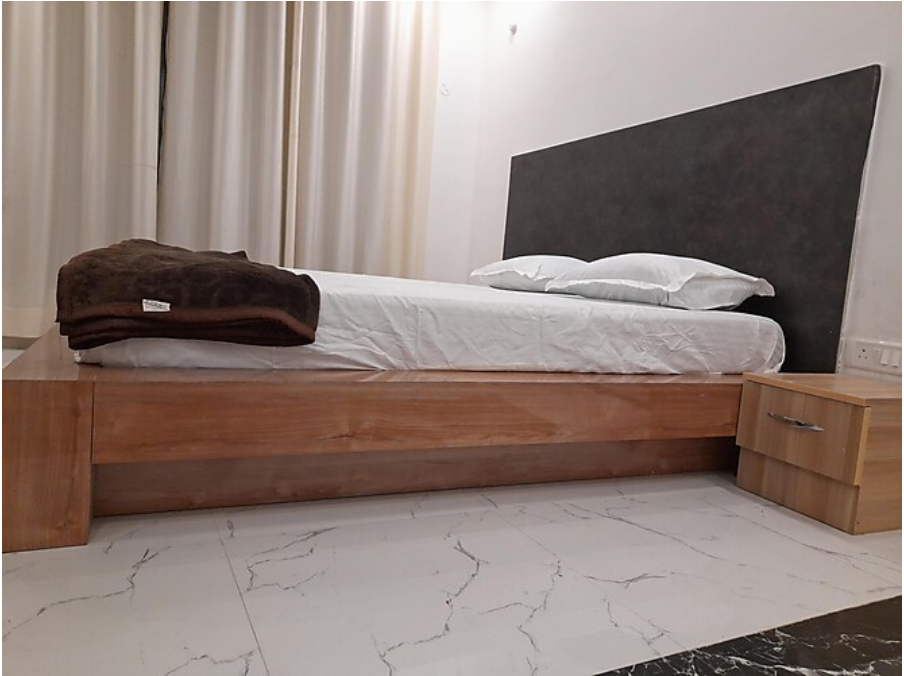 The Ashoka Resort & Banquets Deluxe Room