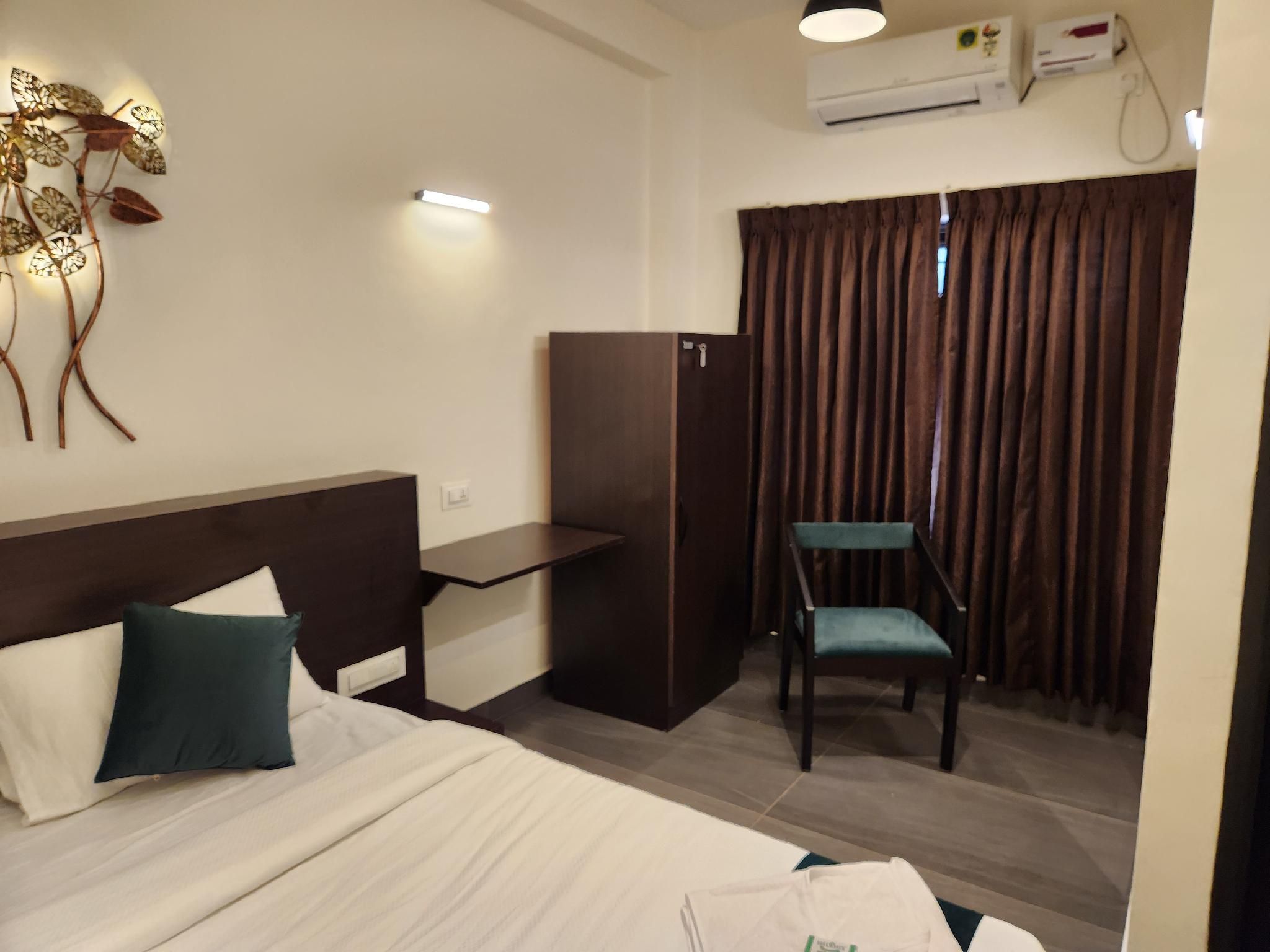 Udupi Comforts Deluxe King Room 2