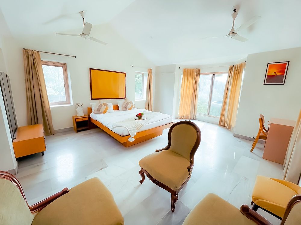 Roomshala 131 Willow Woods Farmhouse Villa