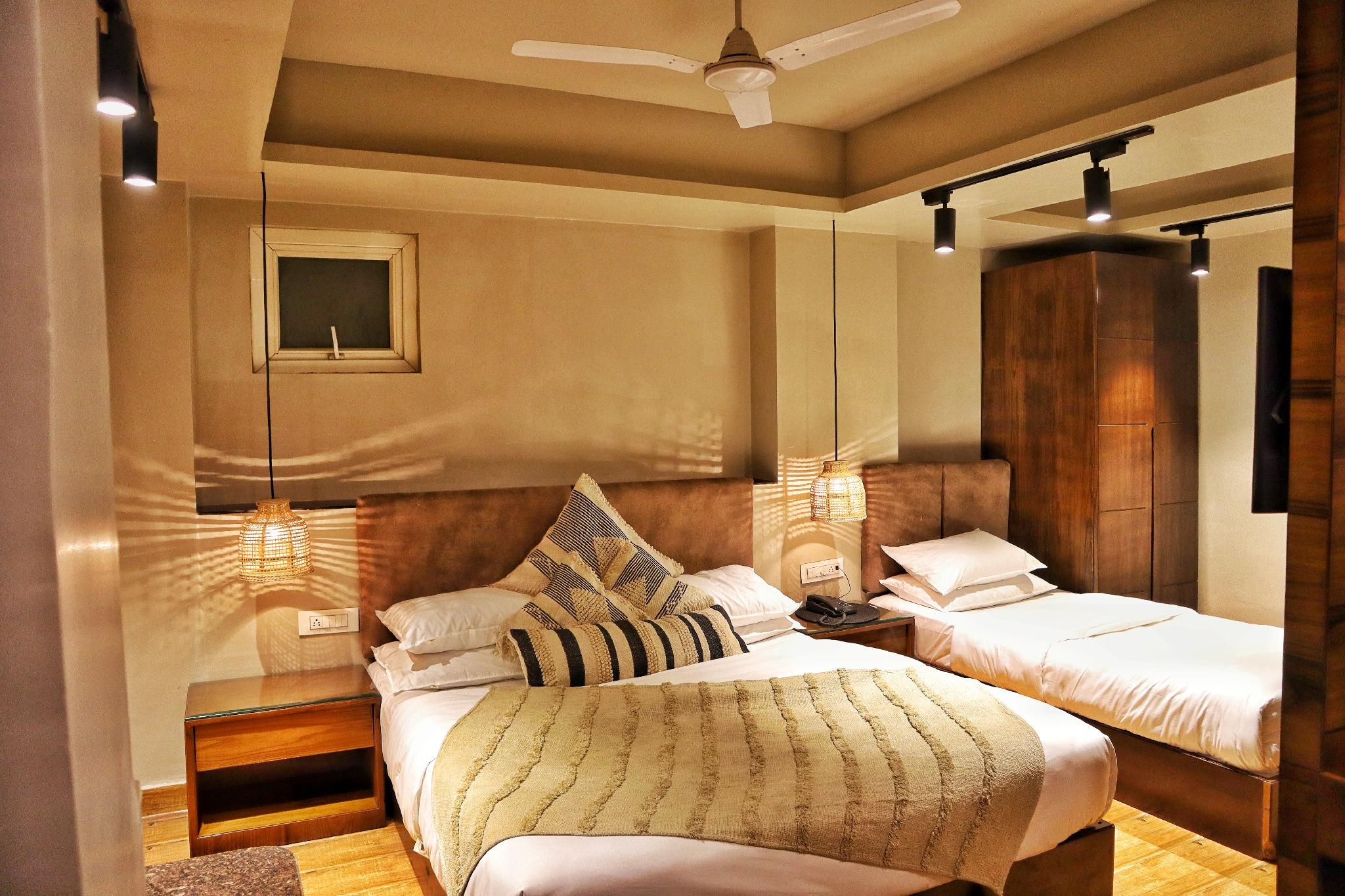 Triple Room - 1 Double Bed and 1 Single Bed