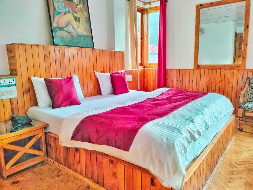 Hotel Devlok International Deluxe Room