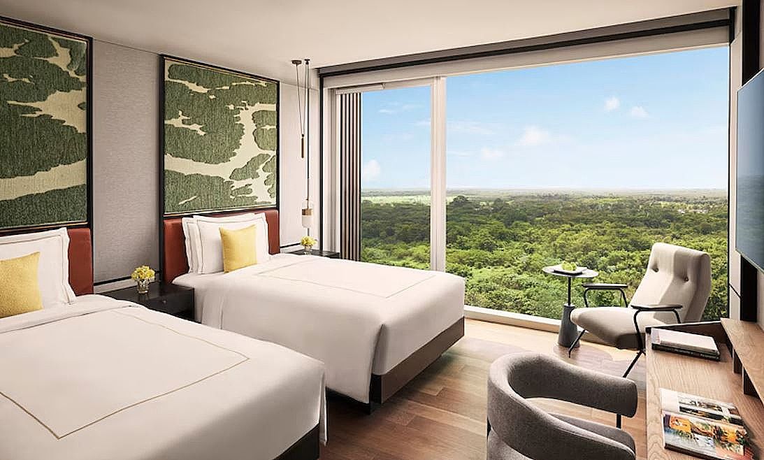 Deluxe Room Twin Bed with Bathtub and Serene Views of Mangrove Forest
