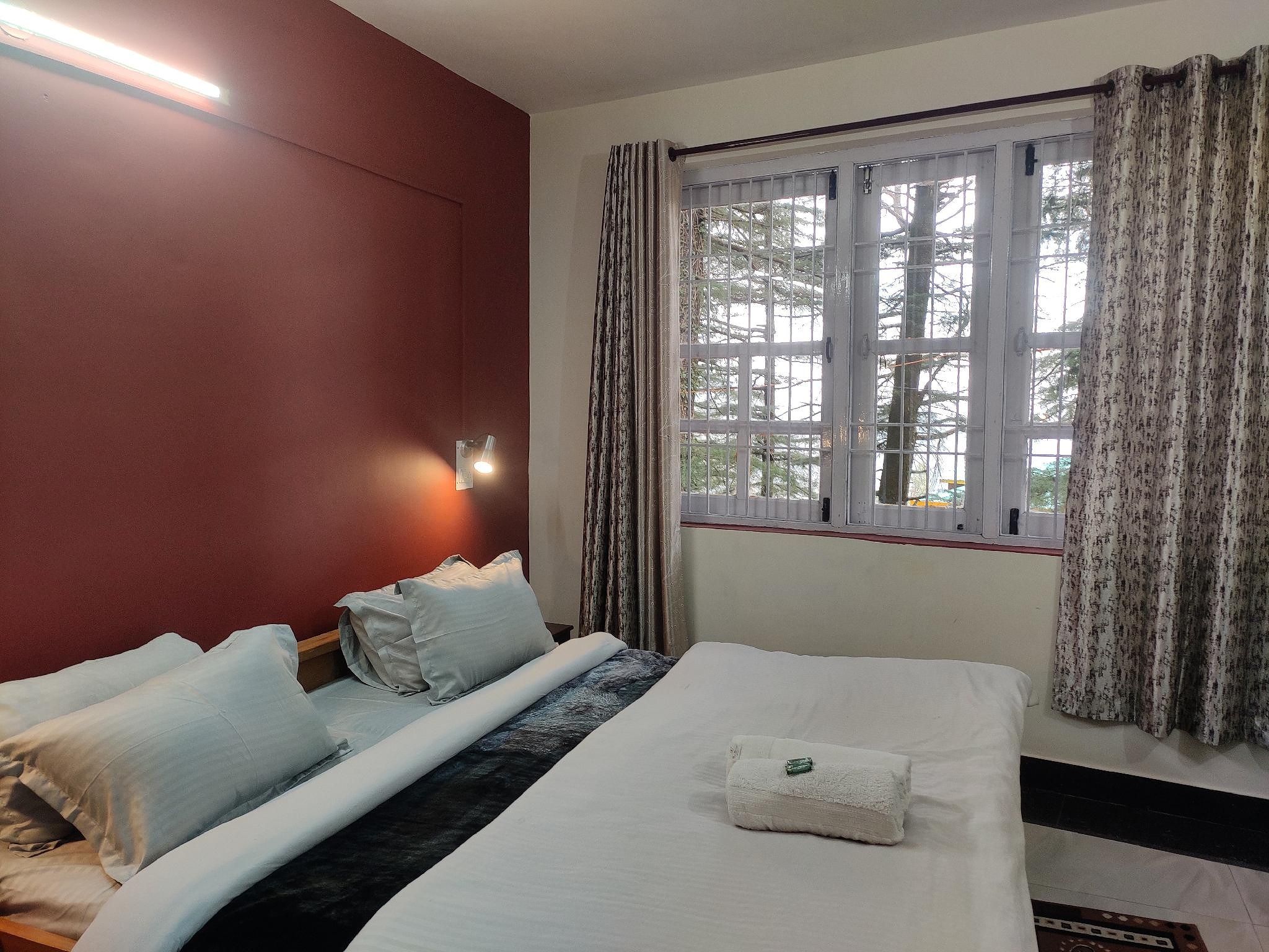 Shree Guest House Deluxe Room