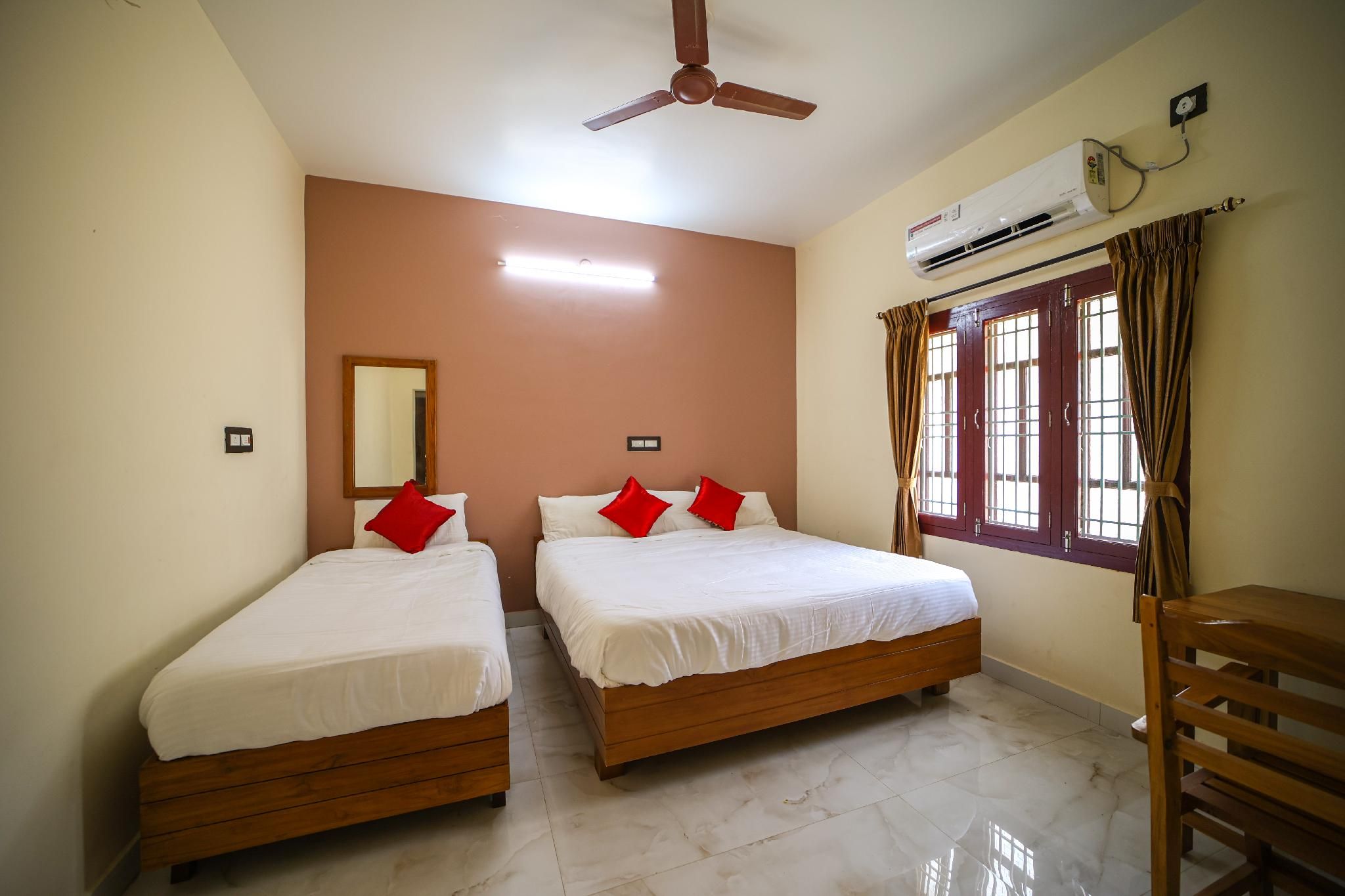 The Pothigai Palace Executive Room