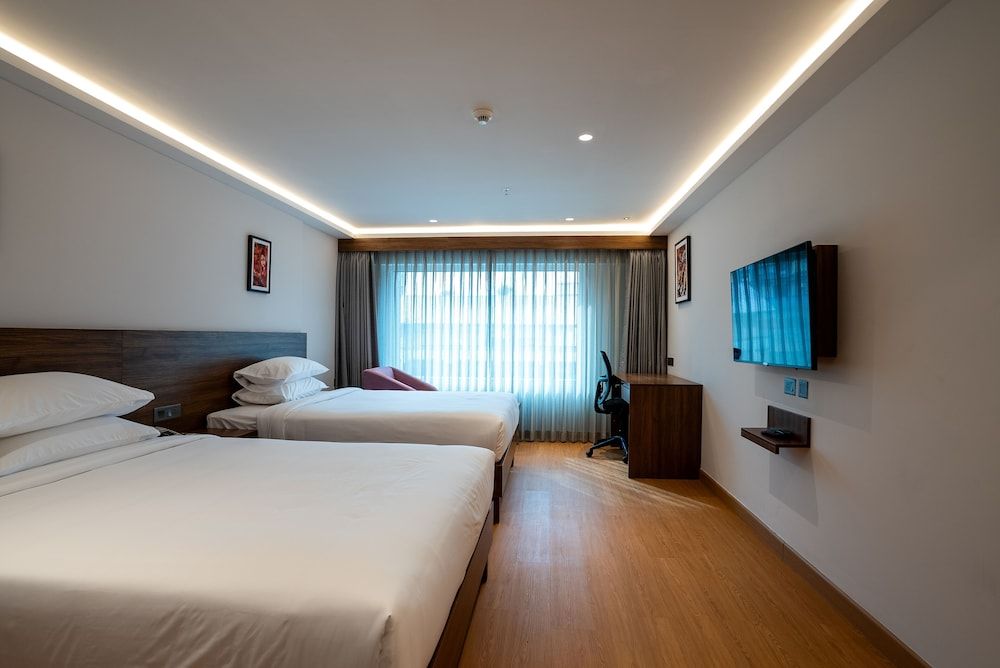 Lilac Hotel Guruvayur Family room 2
