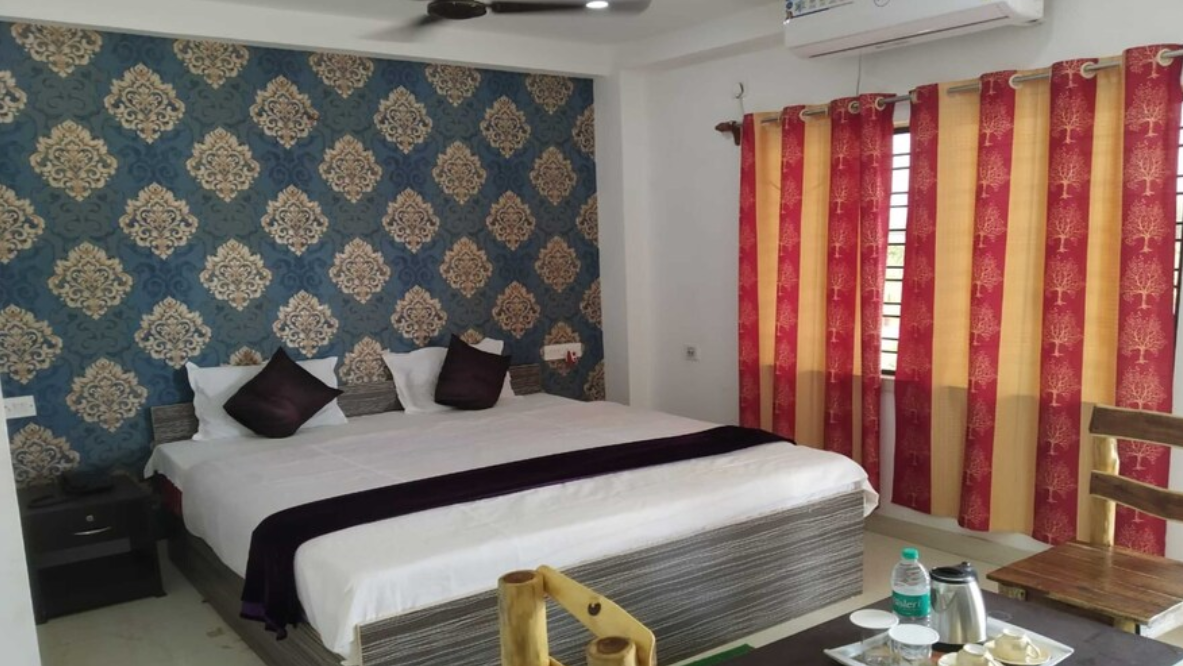 STAYMAKER  Gharana Hotel and Resort Deluxe Room AC 2
