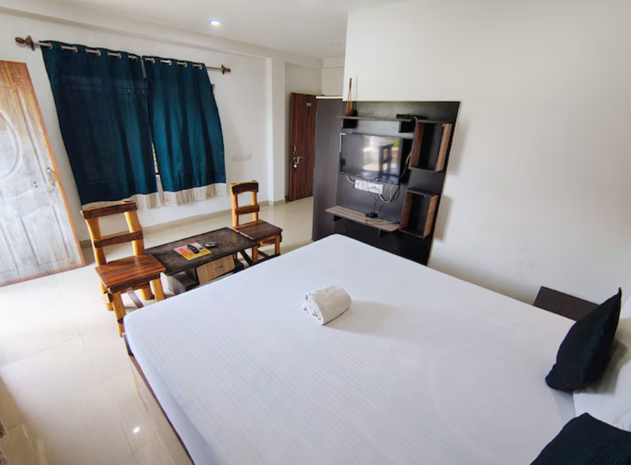 STAYMAKER  Gharana Hotel and Resort Deluxe Room AC 4