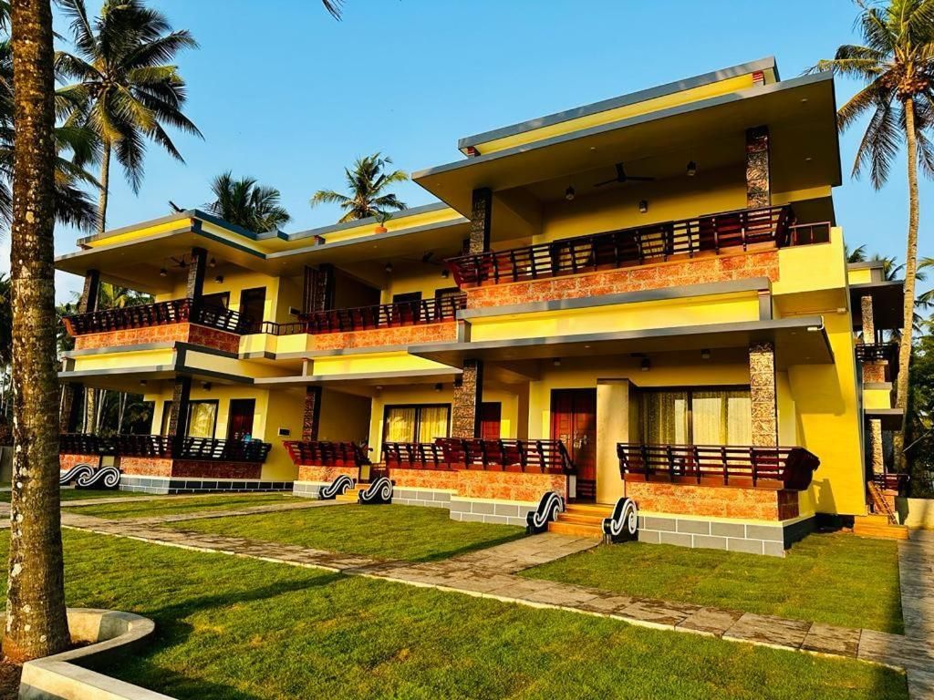 Maadathil Cottages
