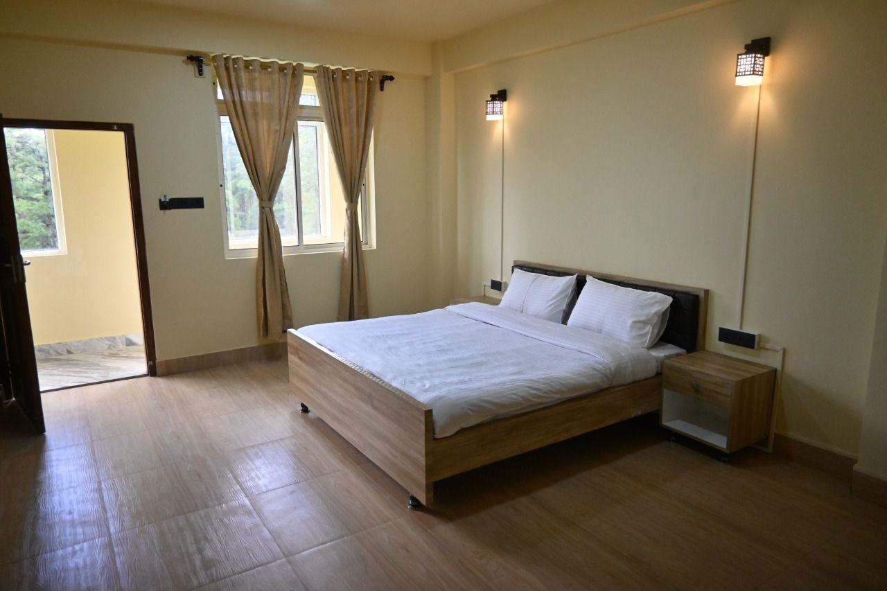 TreeTops Residency Deluxe Double Room 2