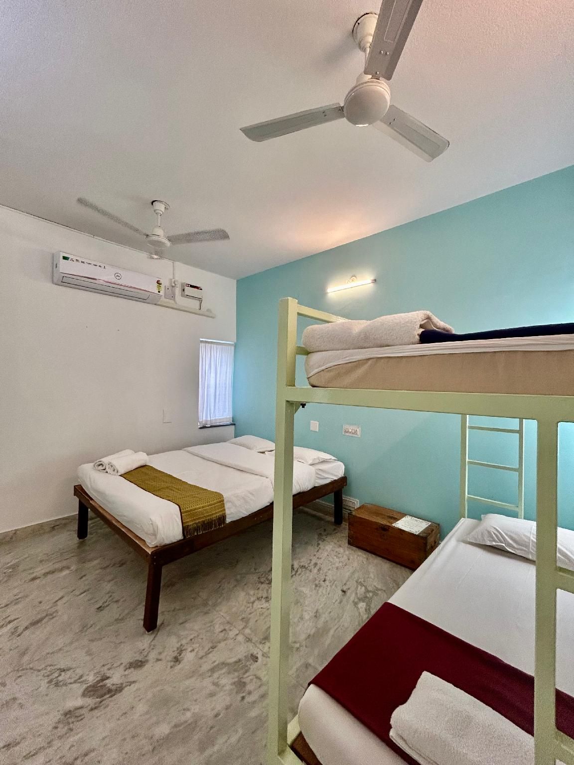 Quadruple Room with Private Bathroom