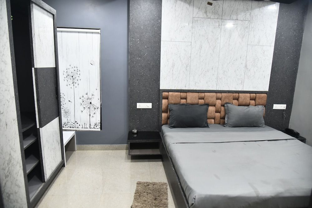 Nirmalya Grand Deluxe Room 8